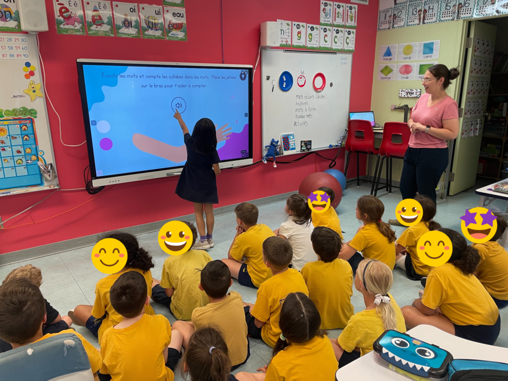 French immersion classroom in Quebec, showing kids using interactive activities